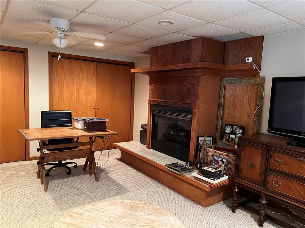 97 Rinkus Drive Indiana, PA 15701 - Photo 17 of 48 a living room with furniture a flat screen tv and a fireplace