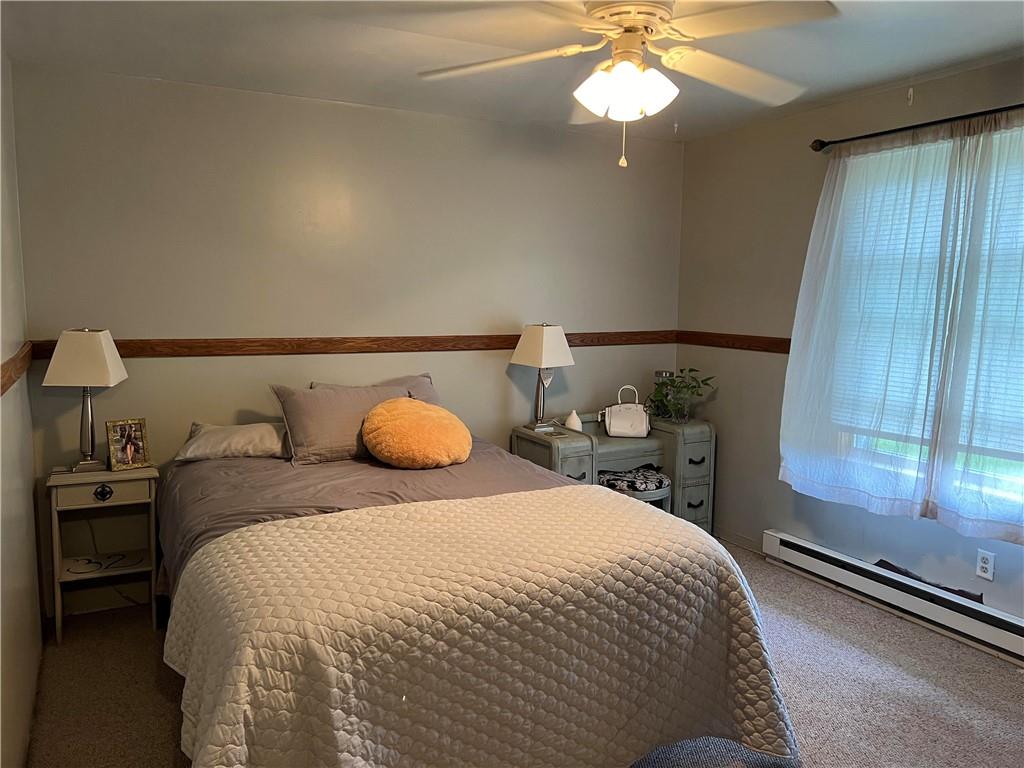 97 Rinkus Drive Indiana, PA 15701 - Photo 10 of 48 a bedroom with a bed and a chandelier