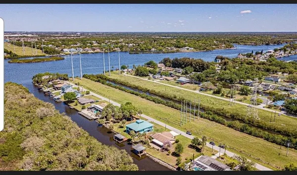 a view of a city with an ocean beach