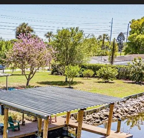 a view of a backyard of the house