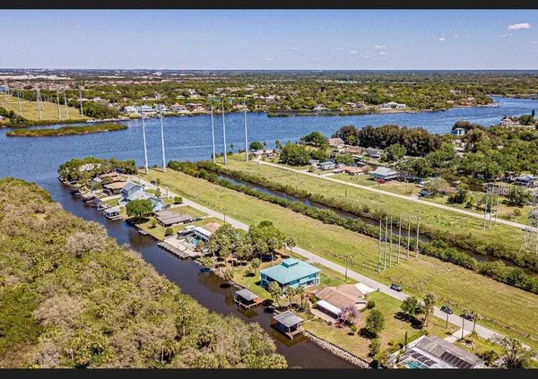 a view of a city with an ocean view