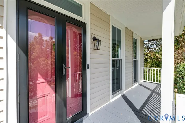 a front view of a house with a glass door