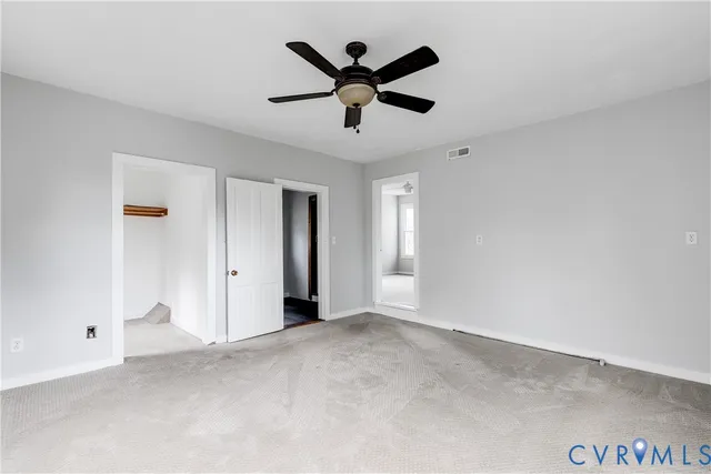 a view of entryway with wooden floor and stairs