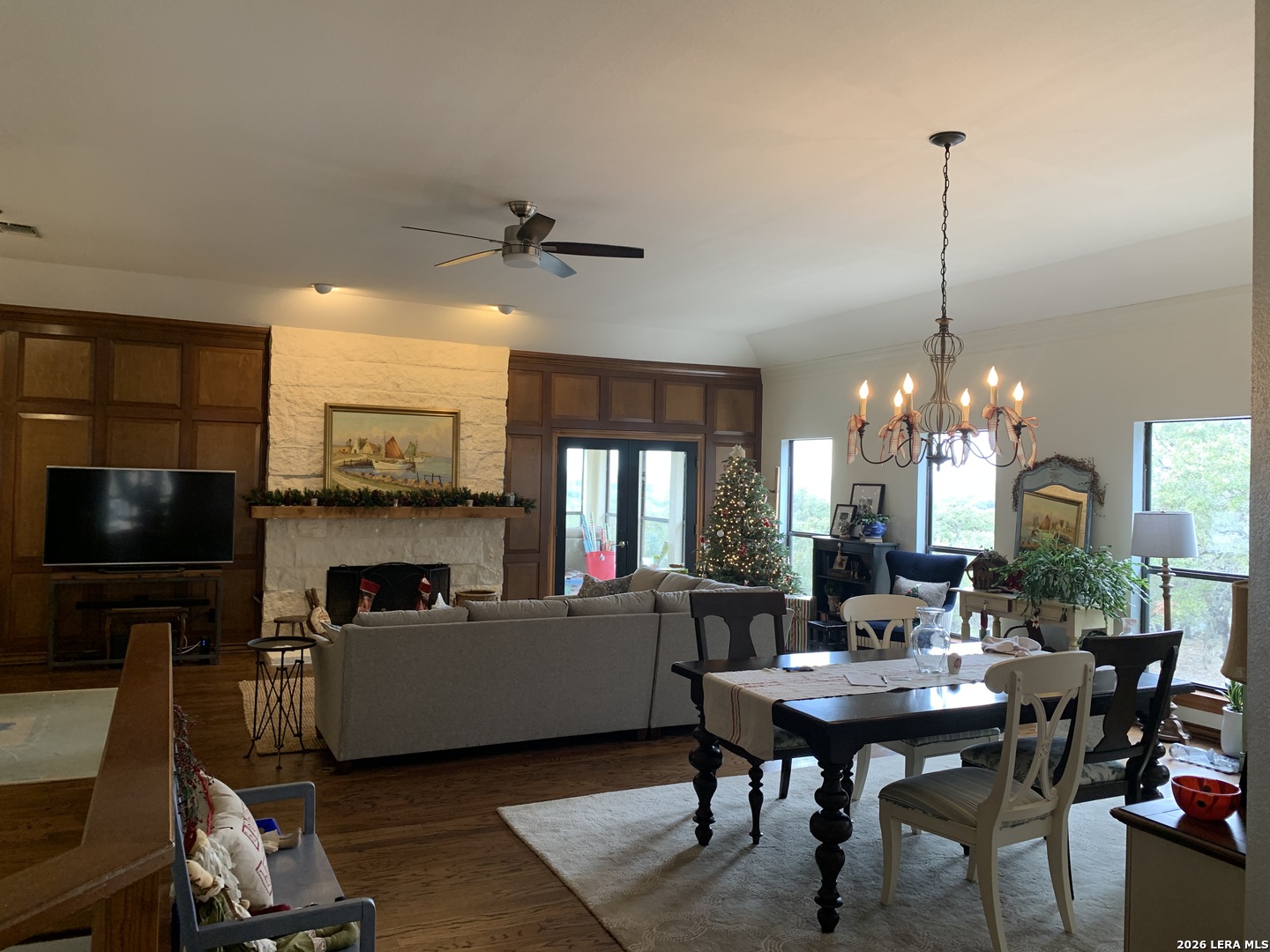 Undisclosed Address Fair Oaks Ranch, TX 78015 - Photo 5 of 12 a view of a dining room with furniture window and wooden floor