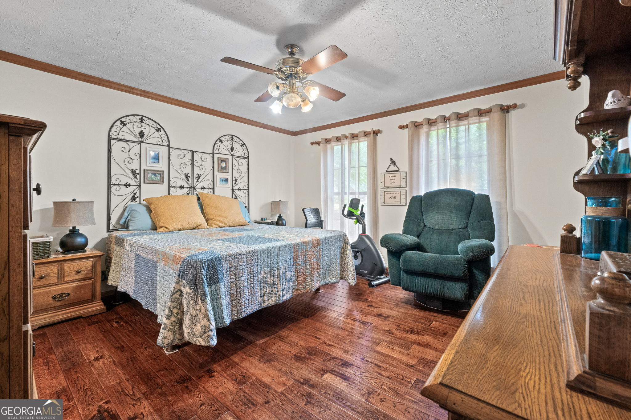 110 The Farm Road McDonough, GA 30252 - Photo 13 of 32 a bedroom with a bed couch and a window