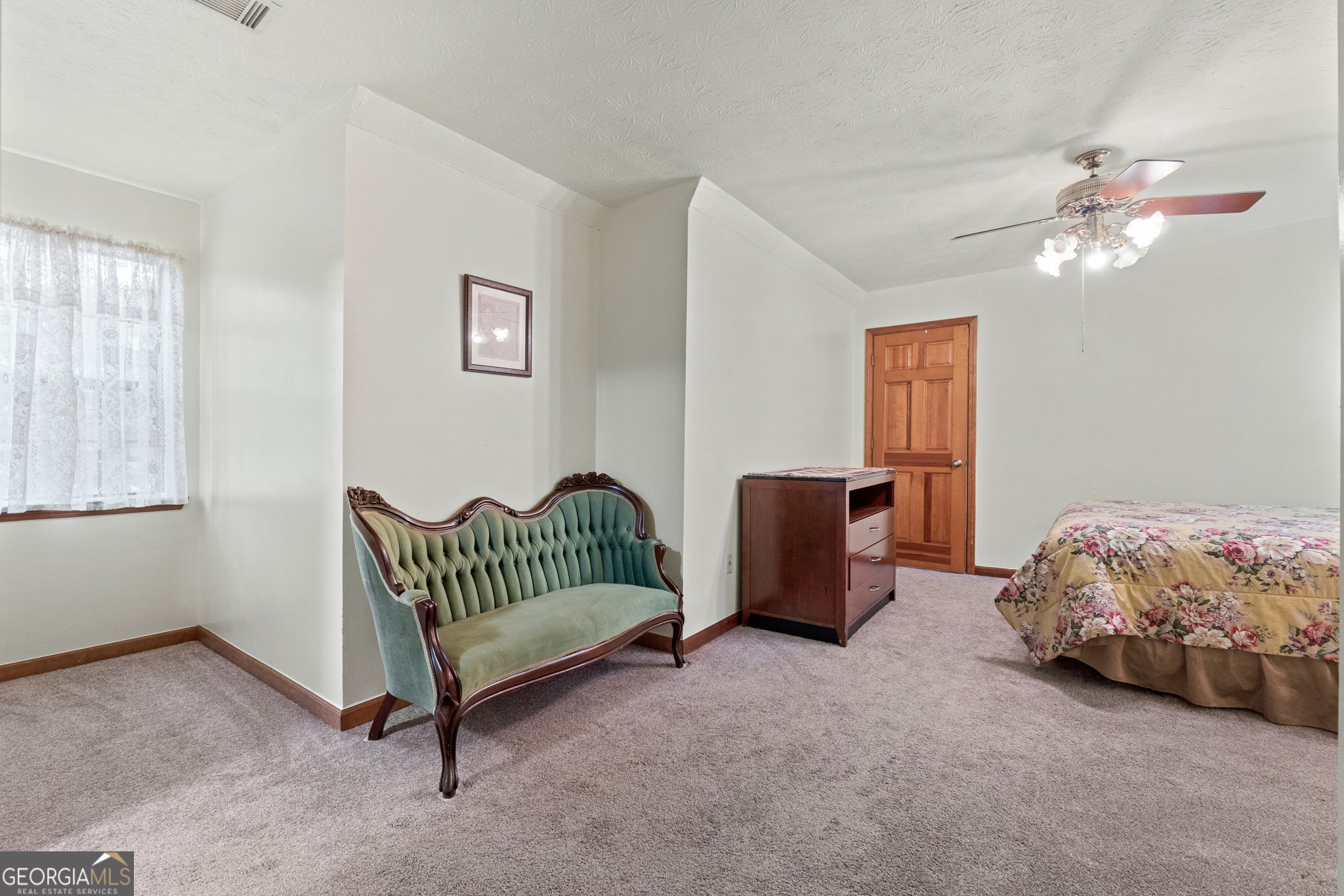 110 The Farm Road McDonough, GA 30252 - Photo 20 of 32 a bedroom with a bed and a window