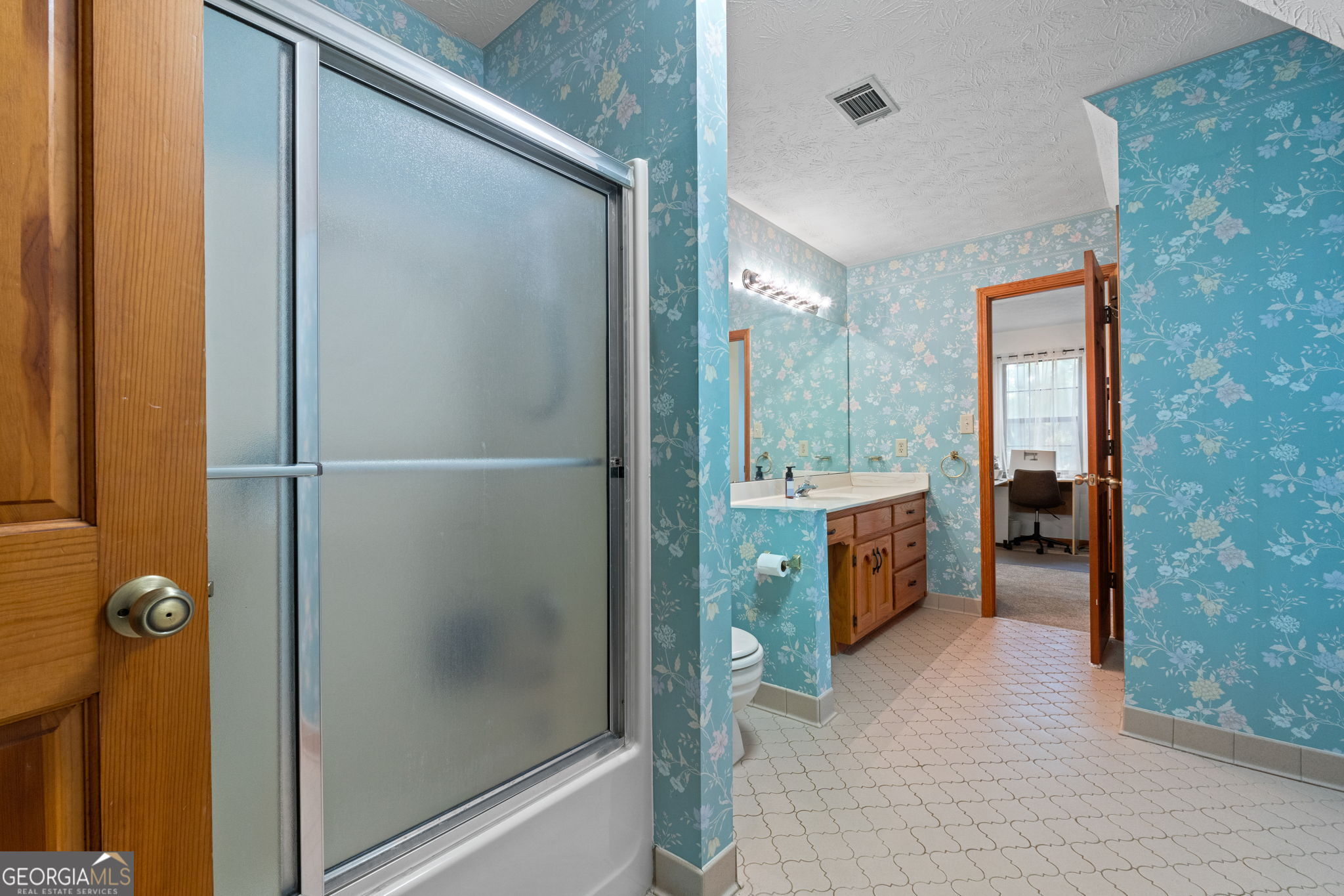 110 The Farm Road McDonough, GA 30252 - Photo 24 of 32 a bathroom with a shower and a sink