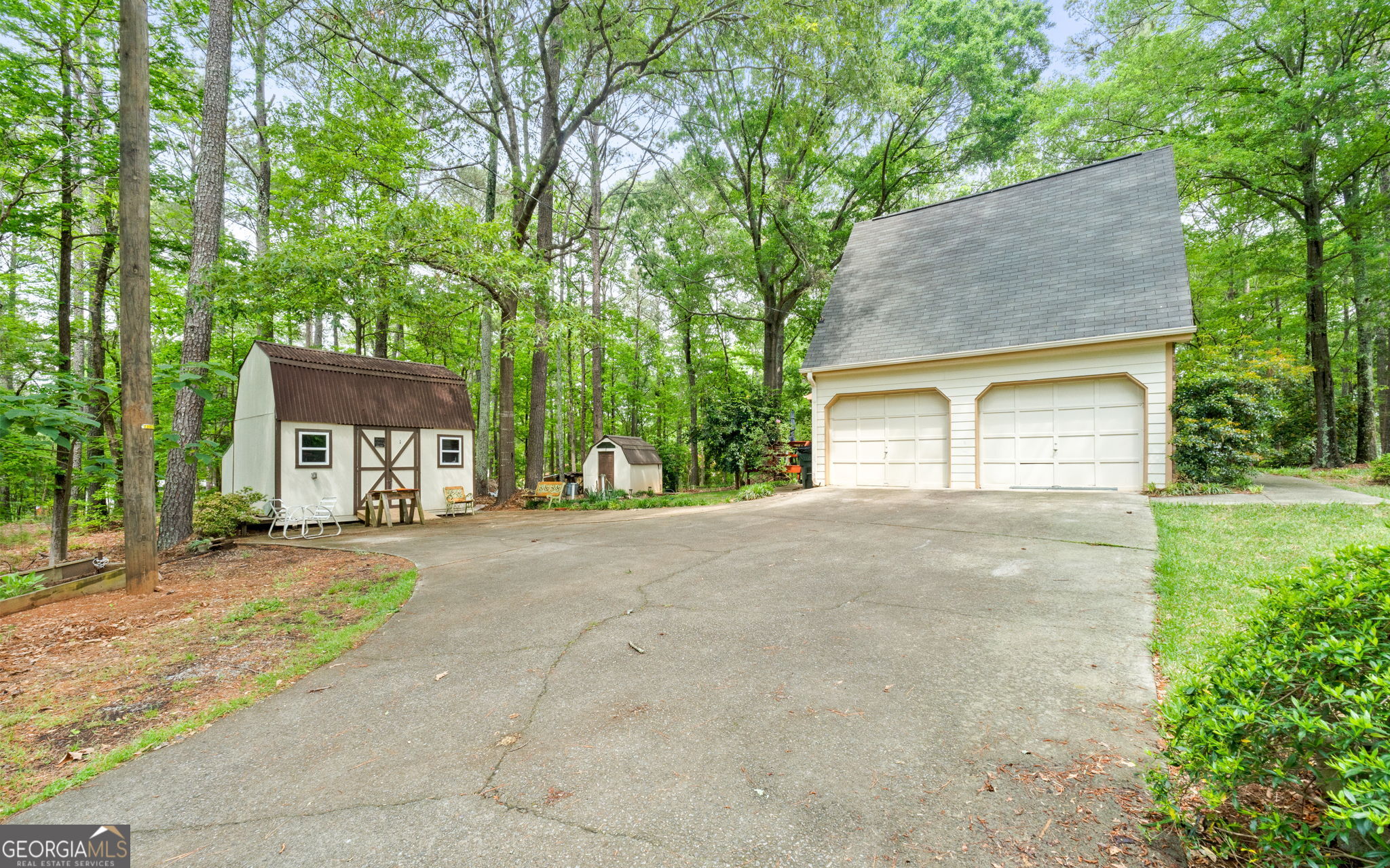 110 The Farm Road McDonough, GA 30252 - Photo 30 of 32 front view of a house with a trees