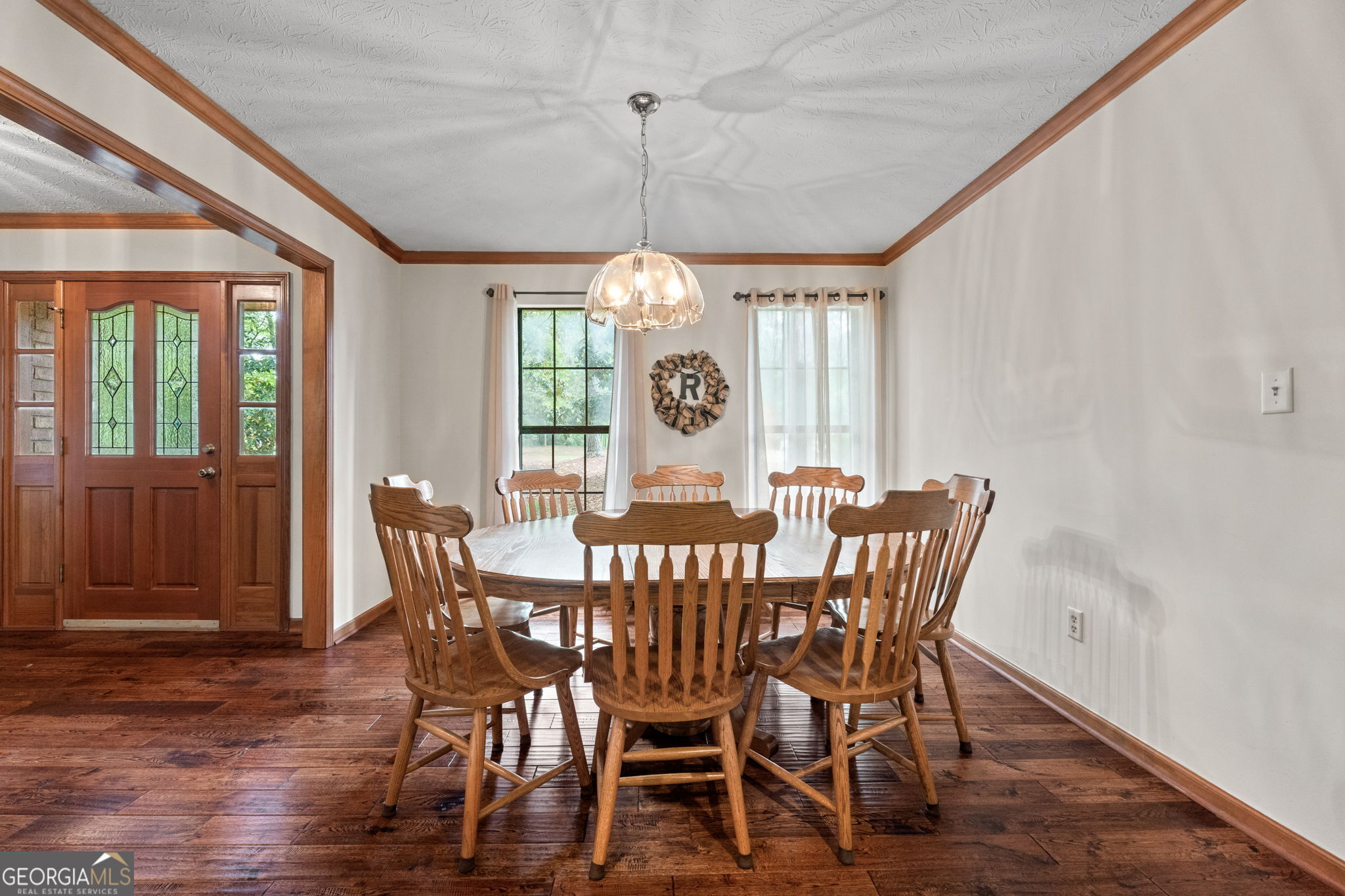 110 The Farm Road McDonough, GA 30252 - Photo 5 of 32 a view of a dining room with furniture window and wooden floor