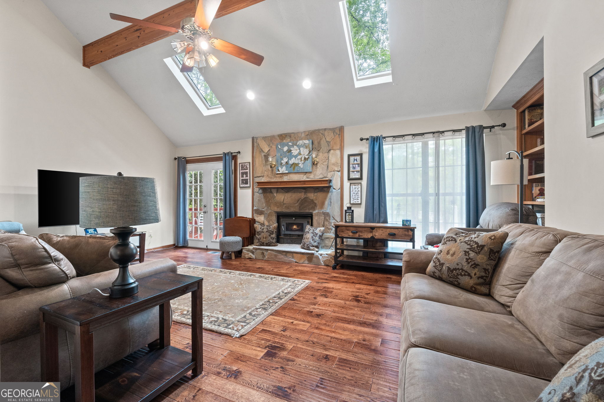 110 The Farm Road McDonough, GA 30252 - Photo 6 of 32 a living room with furniture a fireplace and a flat screen tv
