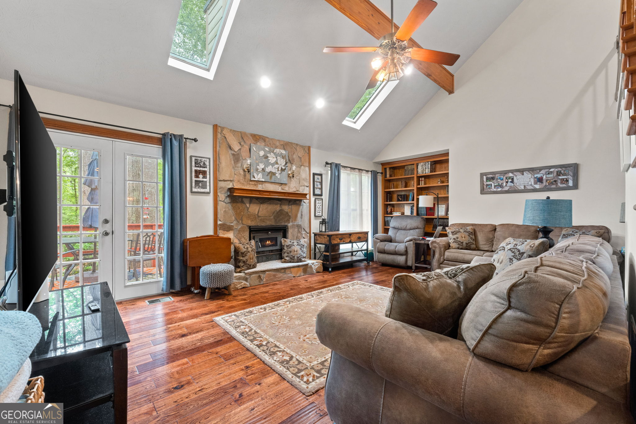 110 The Farm Road McDonough, GA 30252 - Photo 8 of 32 a living room with furniture a fireplace and a flat screen tv