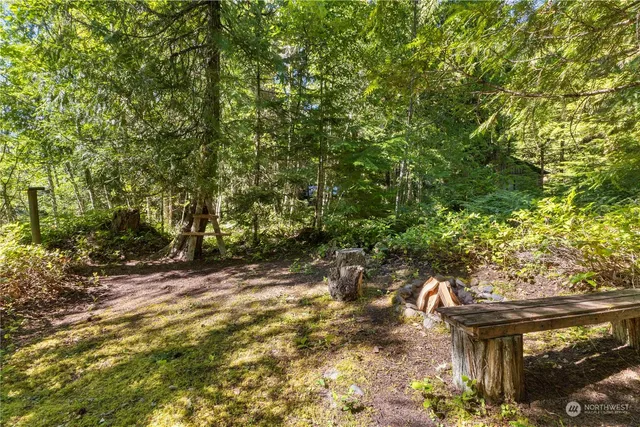 a view of a balcony with chairs and a table