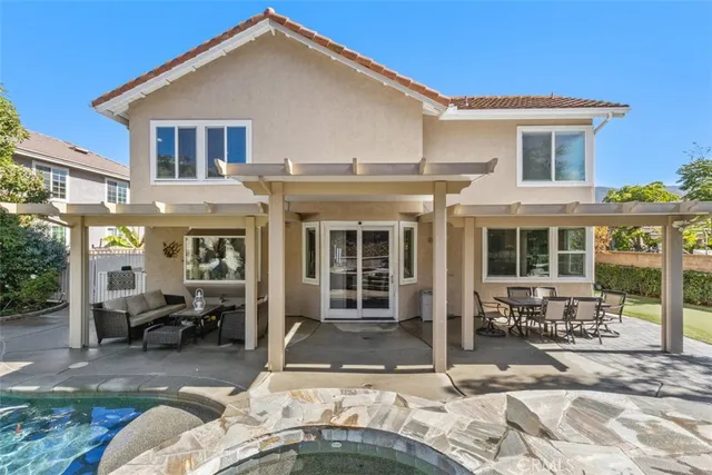 a view of living room kitchen with furniture and gym equipment