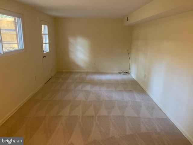 923 Malta Lane Silver Spring, MD 20901 - Photo 26 of 33 Lower level recreation room with rear exit to yard