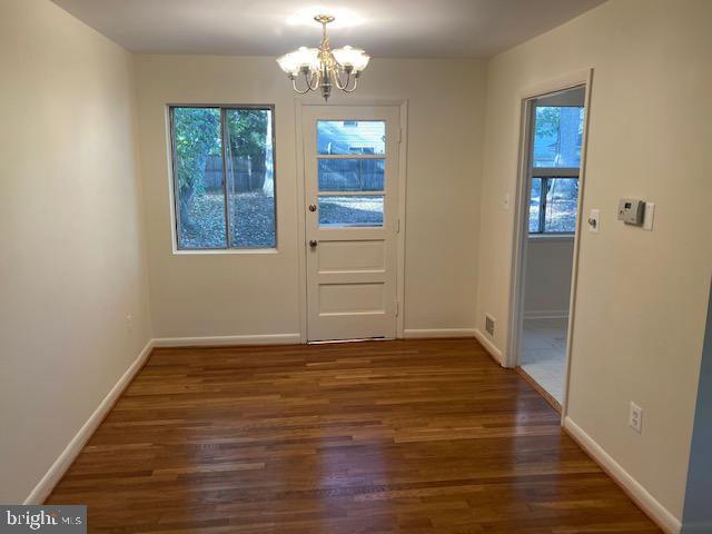 923 Malta Lane Silver Spring, MD 20901 - Photo 4 of 33 Dining room with re-finished hardwood flooring.