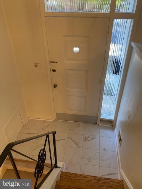 923 Malta Lane Silver Spring, MD 20901 - Photo 8 of 33 Foyer with new tile flooring
