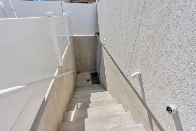 252 North Sunrise Rnch Drive Mapleton, UT 84664 - Photo 48 of 62 Concrete exterior staircase with a white metal handrail