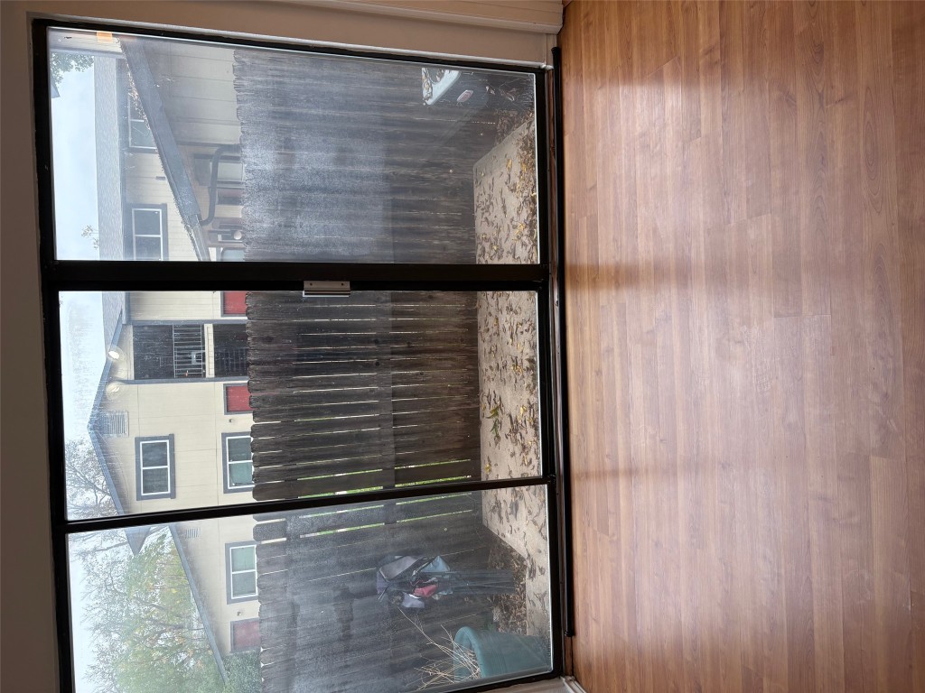 701 Nelray Boulevard, Unit 4 Austin, TX 78751 - Photo 6 of 10 a view of a glass door