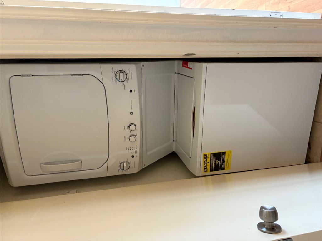 701 Nelray Boulevard, Unit 4 Austin, TX 78751 - Photo 10 of 10 a utility room with dryer and washer