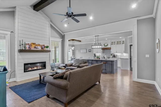 a kitchen with granite countertop a sink appliances counter top space and furniture