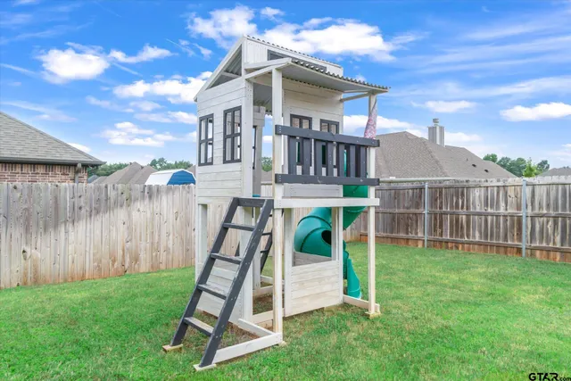 a view of a house with a garden
