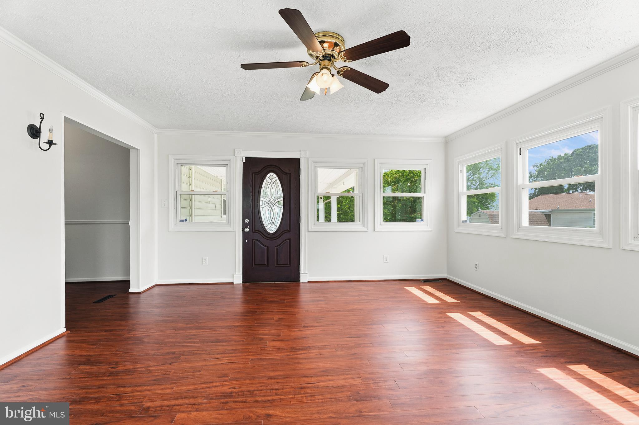 530 Holly Hunt Road Baltimore, MD 21220 - Photo 14 of 37 Spacious Sunroom w/ Rear Patio Door