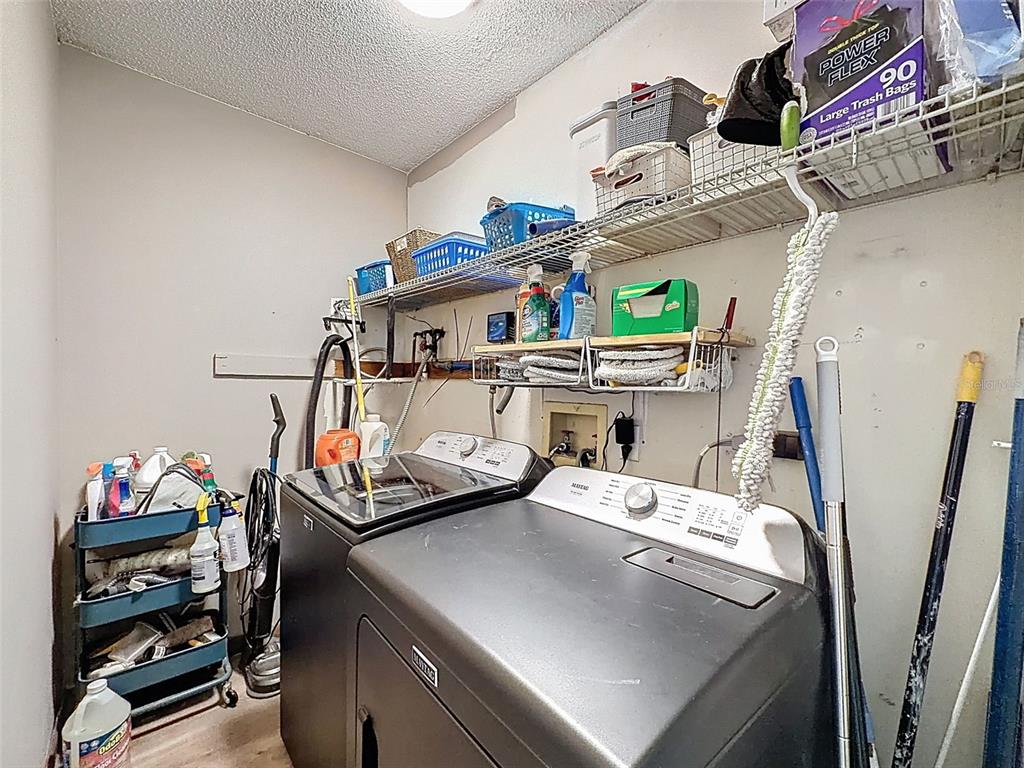 24350 Lanark Road Brooksville, FL 34601 - Photo 28 of 56 a utility room with dryer and washer