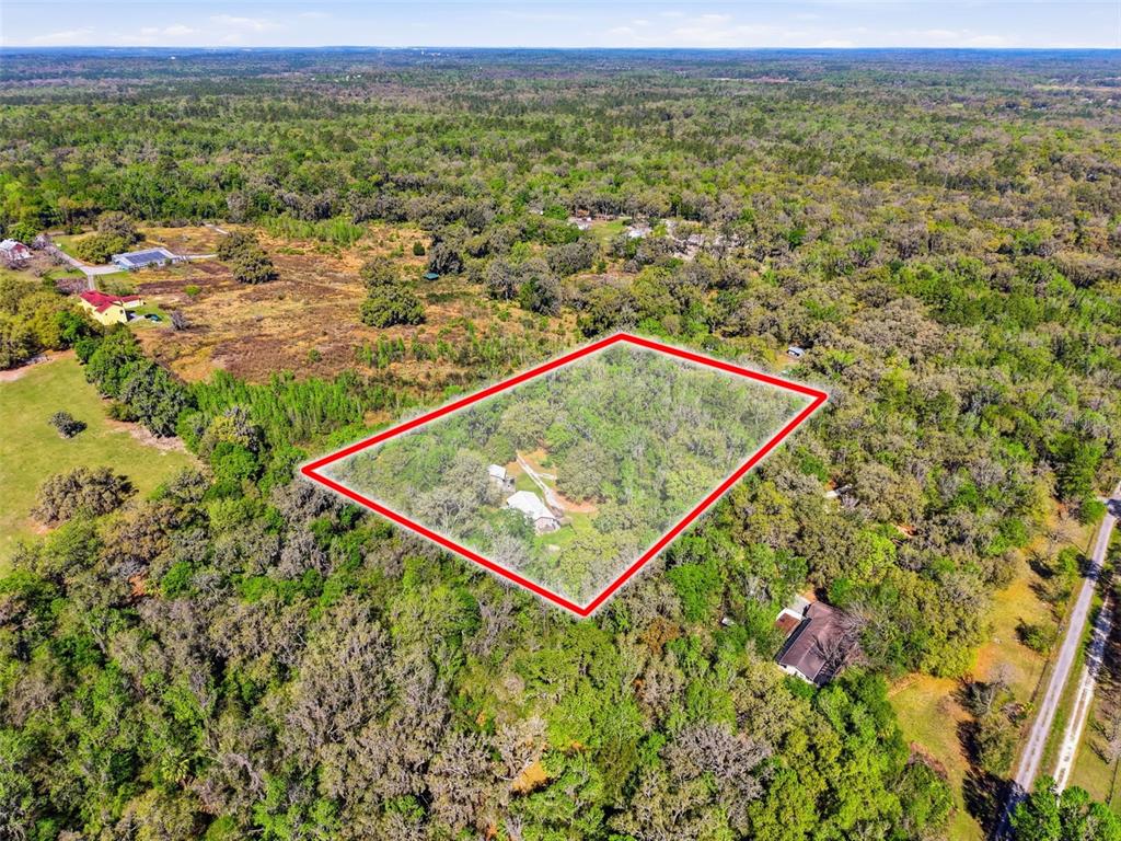 24350 Lanark Road Brooksville, FL 34601 - Photo 47 of 56 a view of a field with an ocean