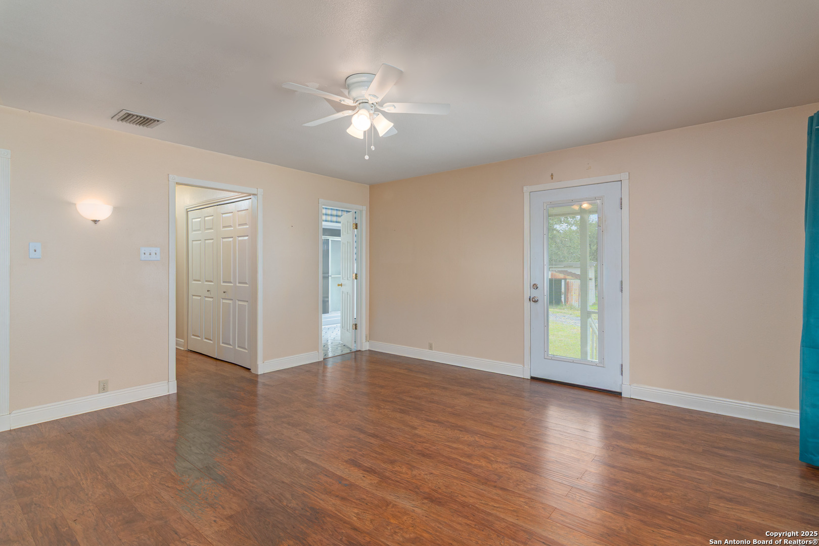 2981 Vivroux Ranch Road Seguin, TX 78155 - Photo 21 of 50 a view of an empty room with wooden floor and a window