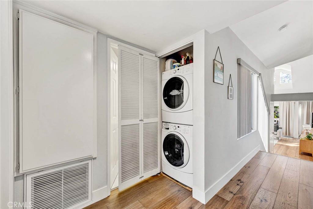 789 Grayling Bay Costa Mesa, CA 92626 - Photo 15 of 42 a view of kitchen and utility room with washer and dryer