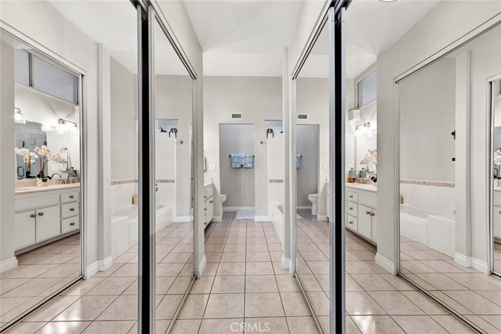 789 Grayling Bay Costa Mesa, CA 92626 - Photo 24 of 42 a bathroom with a shower and a sink