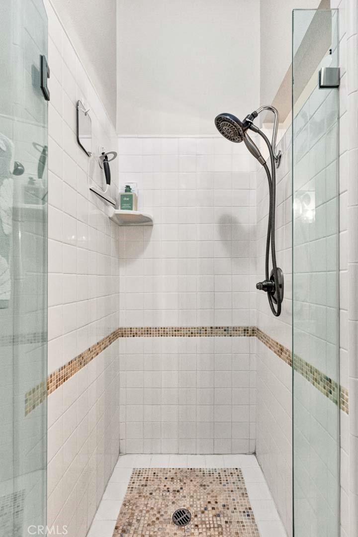 789 Grayling Bay Costa Mesa, CA 92626 - Photo 27 of 42 a bathroom with a shower