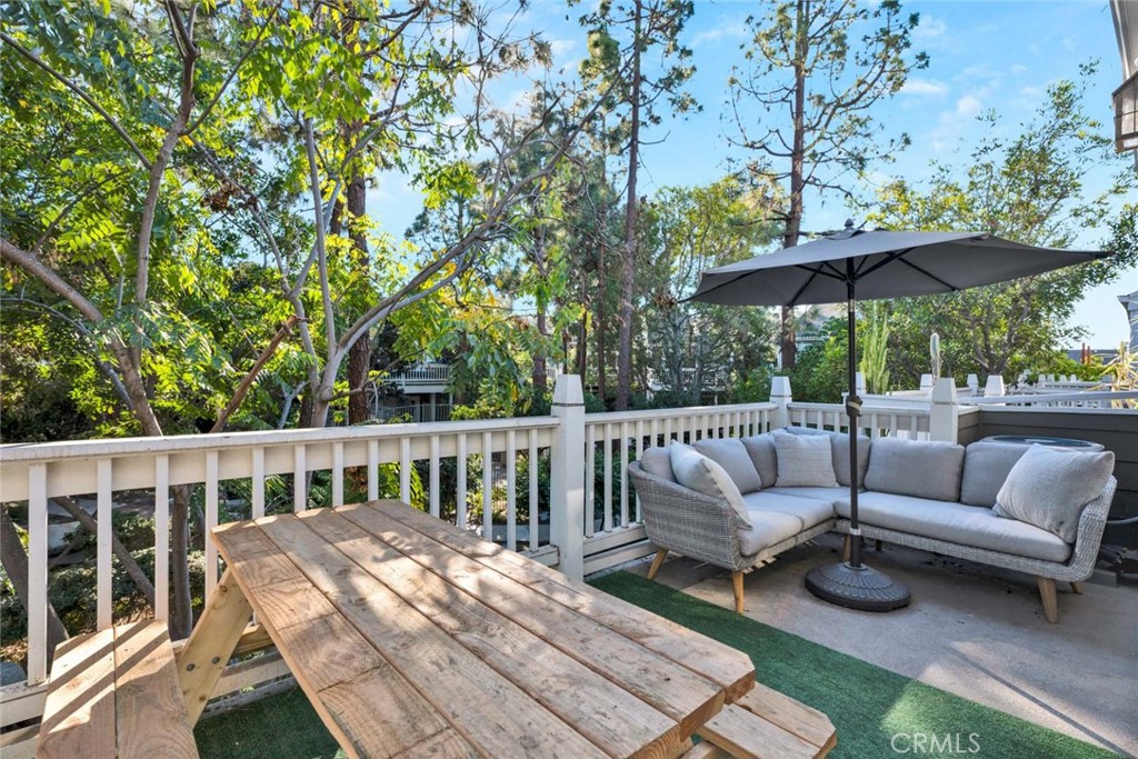 789 Grayling Bay Costa Mesa, CA 92626 - Photo 28 of 42 a view of a patio with a table and chairs