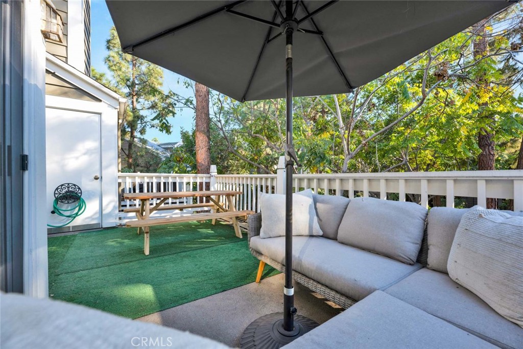 789 Grayling Bay Costa Mesa, CA 92626 - Photo 30 of 42 a view of a chair and table of the house