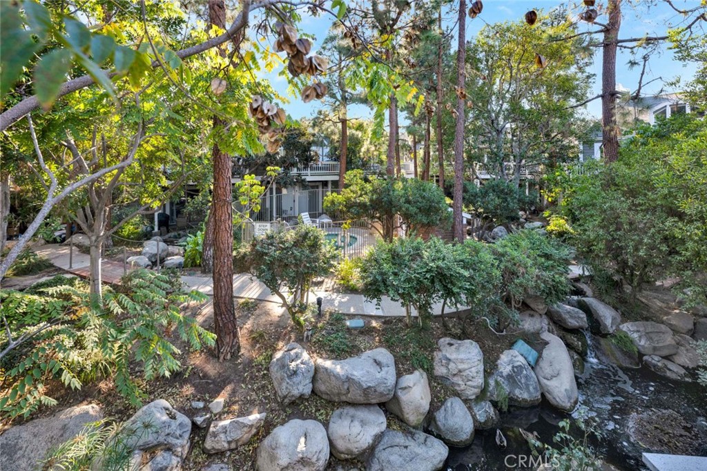 789 Grayling Bay Costa Mesa, CA 92626 - Photo 34 of 42 a backyard of a house with lots of green space