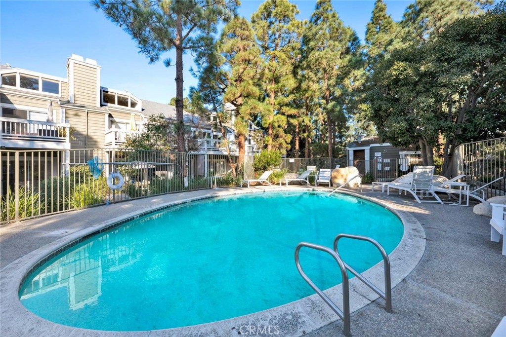 789 Grayling Bay Costa Mesa, CA 92626 - Photo 40 of 42 a view of swimming pool from a lounge chair