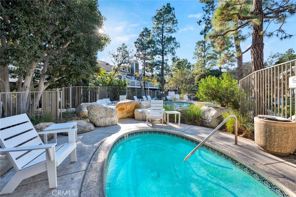 789 Grayling Bay Costa Mesa, CA 92626 - Photo 41 of 42 a view of a patio with couches chairs and potted plants