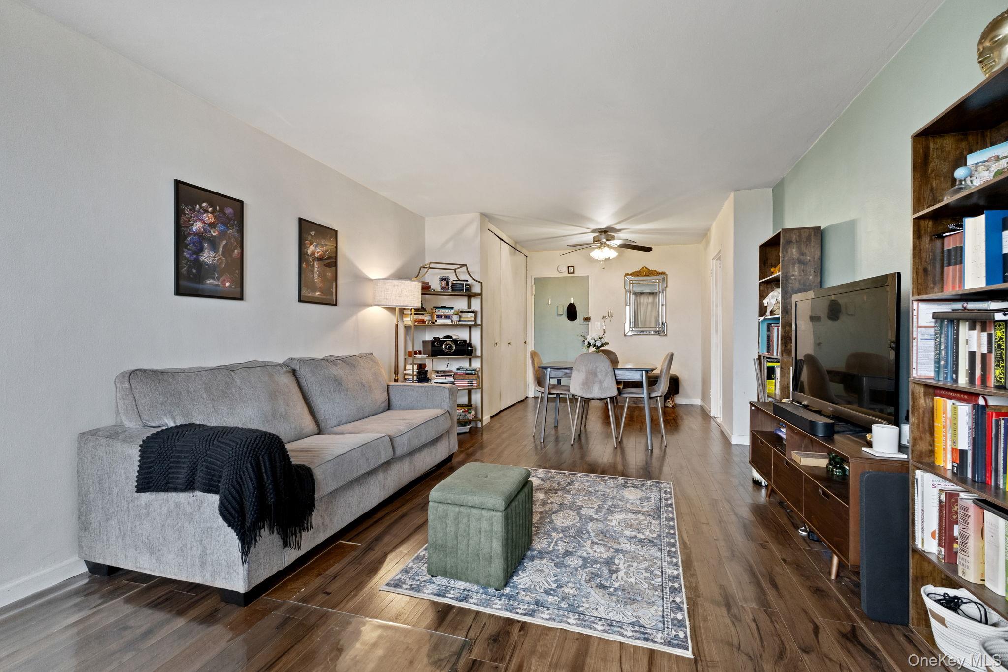3121 Middletown Road, Unit 7L Bronx, NY 10461 - Photo 12 of 23 a living room with furniture and a flat screen tv