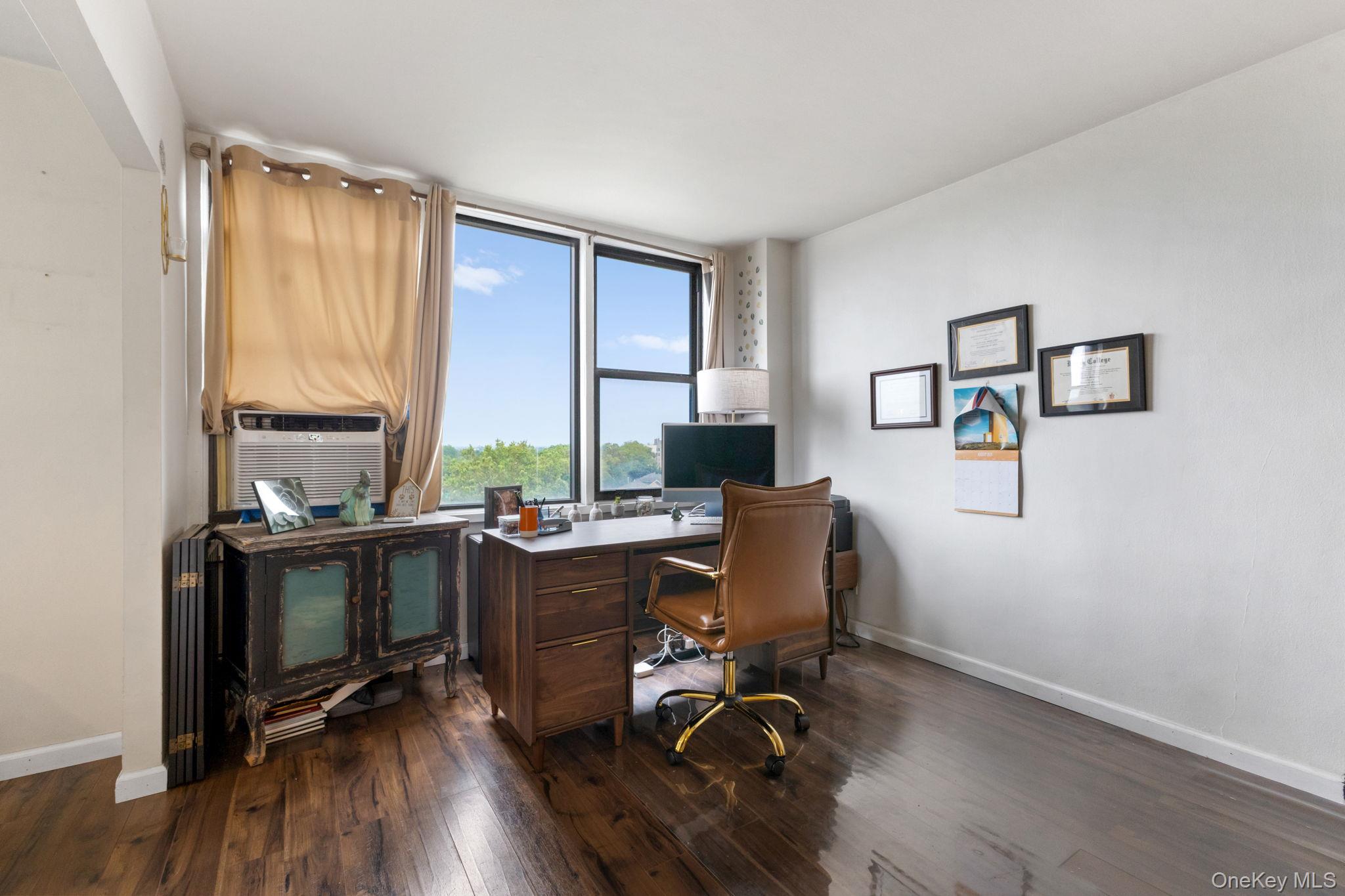 3121 Middletown Road, Unit 7L Bronx, NY 10461 - Photo 15 of 23 a view of a workspace with furniture and a window