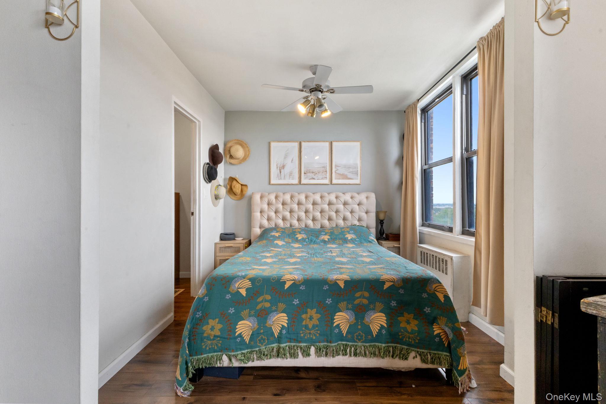 3121 Middletown Road, Unit 7L Bronx, NY 10461 - Photo 16 of 23 a bedroom with a bed window and a table