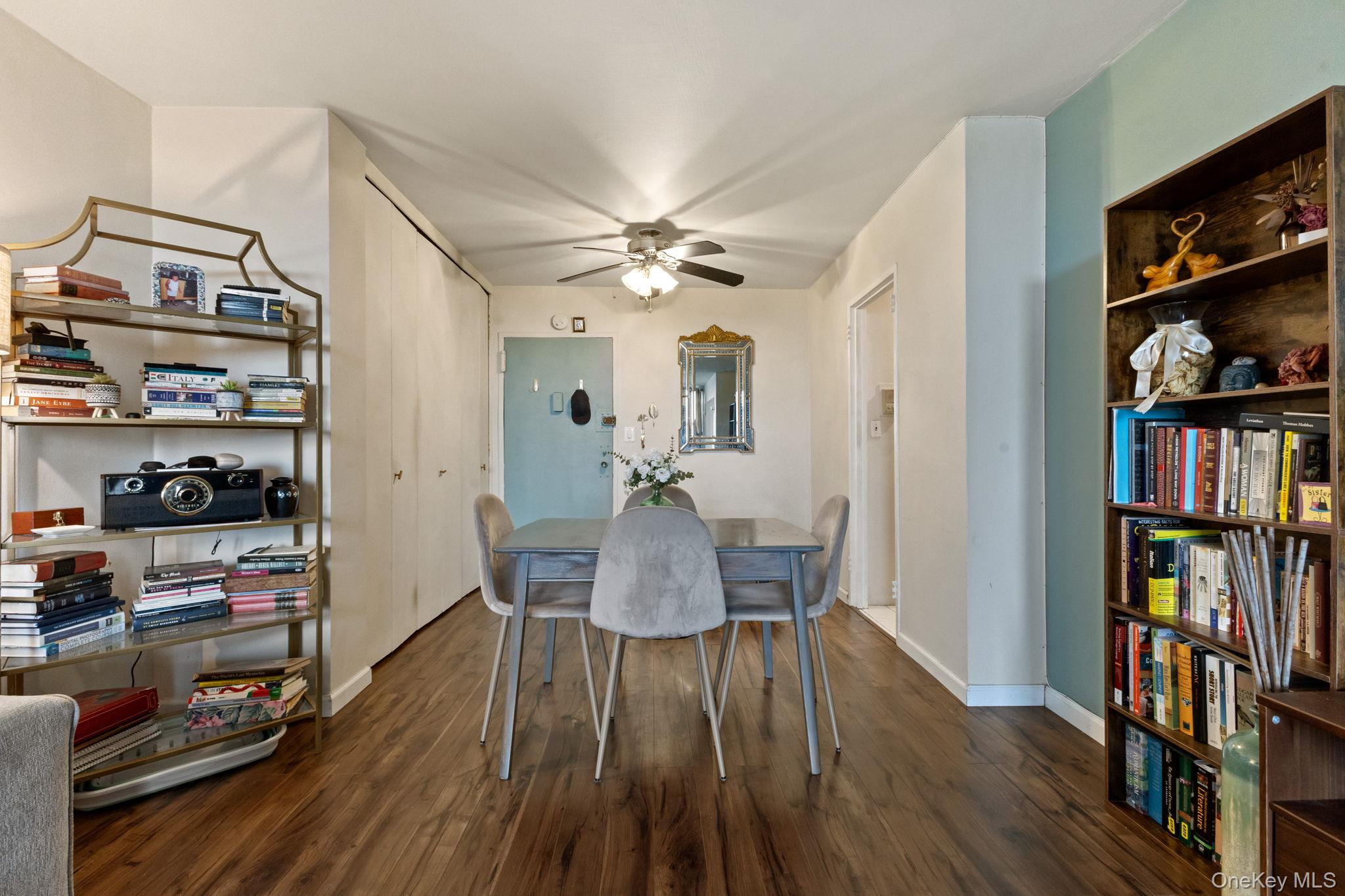 3121 Middletown Road, Unit 7L Bronx, NY 10461 - Photo 4 of 23 a view of a workspace with furniture and book shelf