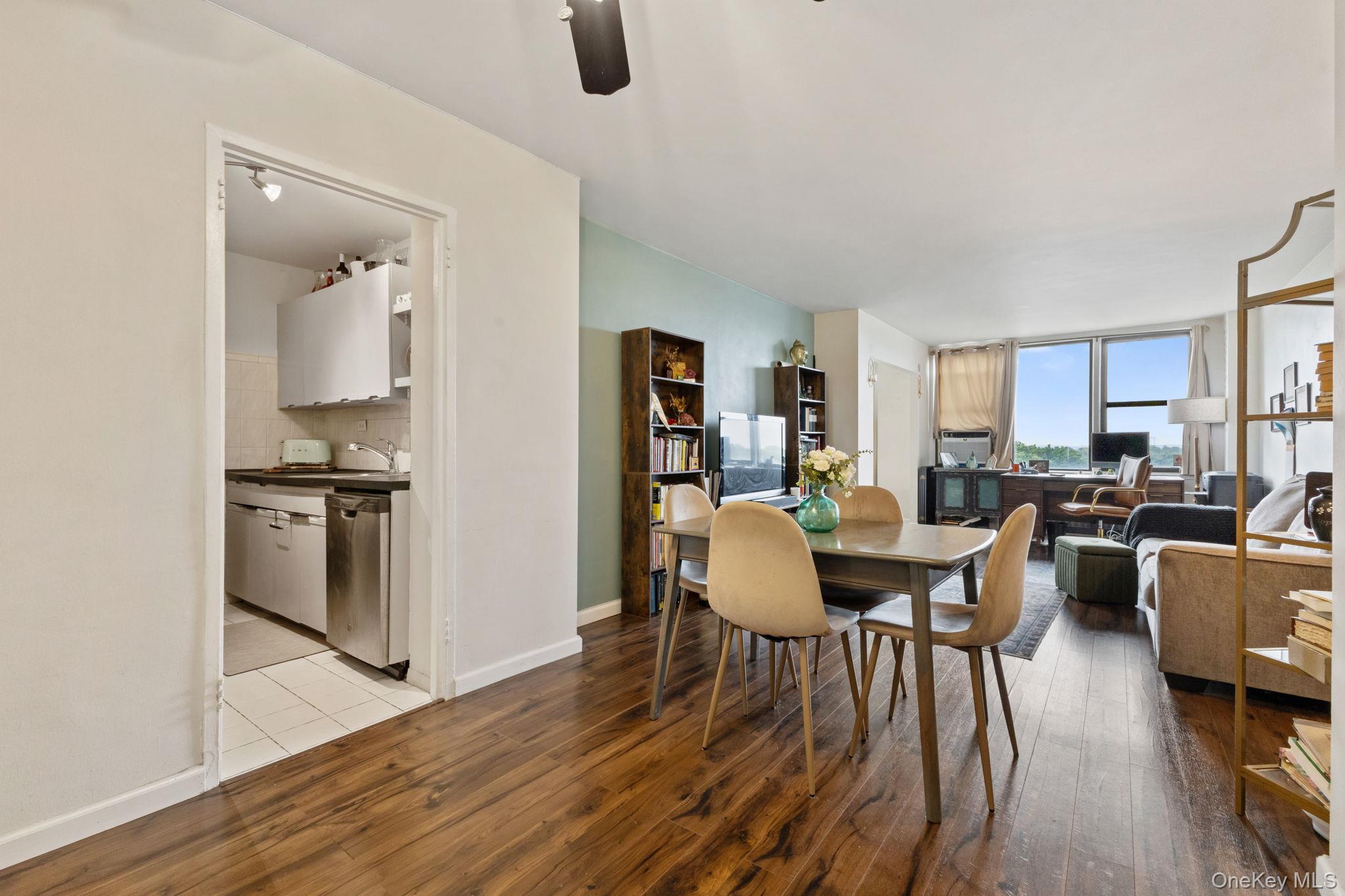 3121 Middletown Road, Unit 7L Bronx, NY 10461 - Photo 6 of 23 a view of a dining room with furniture and wooden floor