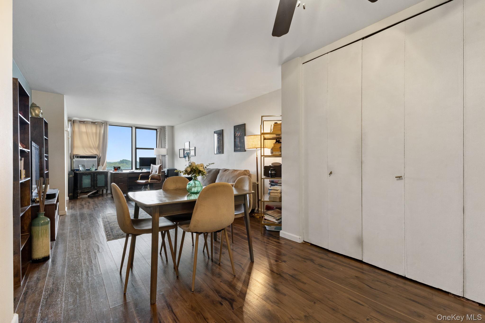 3121 Middletown Road, Unit 7L Bronx, NY 10461 - Photo 7 of 23 a view of a a dining room with furniture window and wooden floor