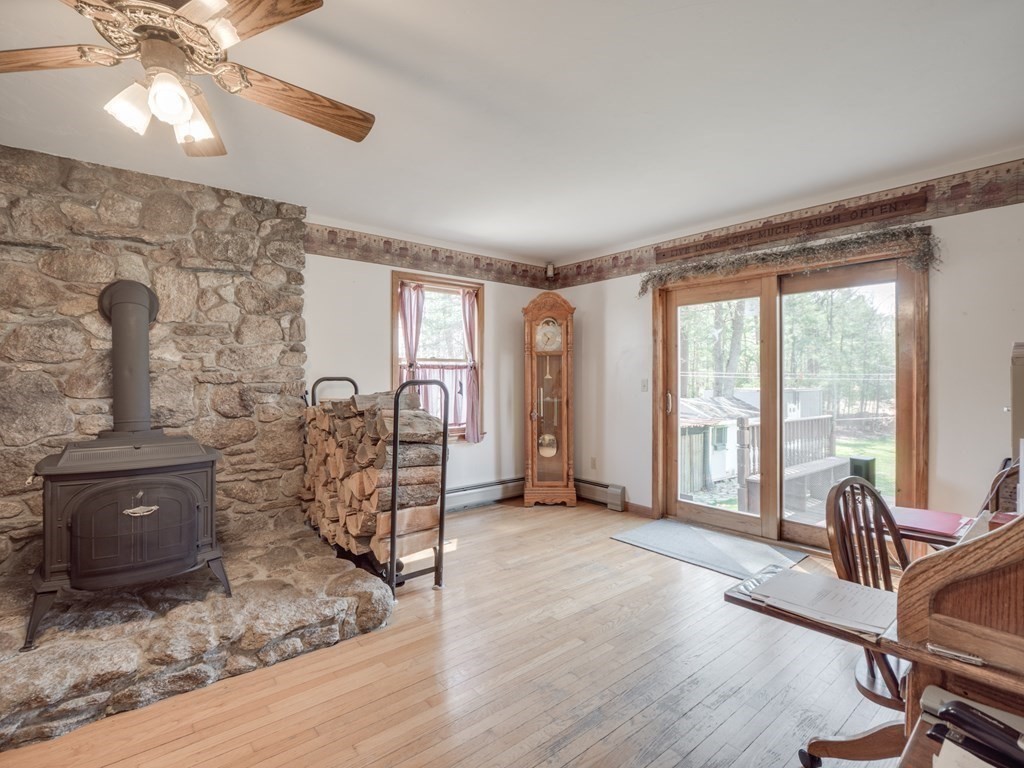 293 Perry Hill Road Acushnet, MA 02743 - Photo 18 of 42 a view of a livingroom with furniture and windows