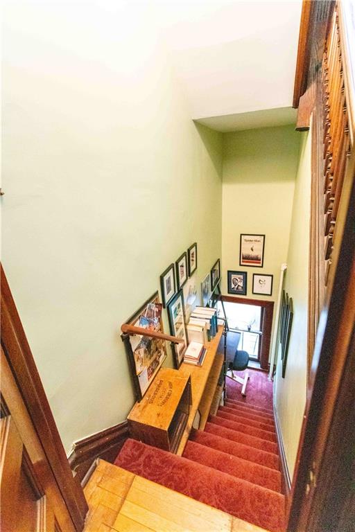 5901 Hampton Street Pittsburgh, PA 15206 - Photo 27 of 42 a view of a living room with wooden floor