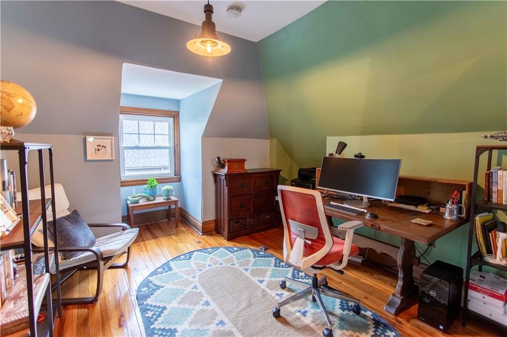5901 Hampton Street Pittsburgh, PA 15206 - Photo 29 of 42 a workspace with furniture and wooden floor
