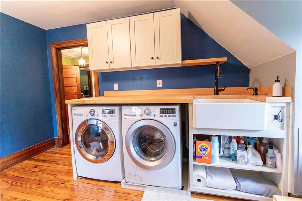 5901 Hampton Street Pittsburgh, PA 15206 - Photo 31 of 42 a utility room with dryer and washer