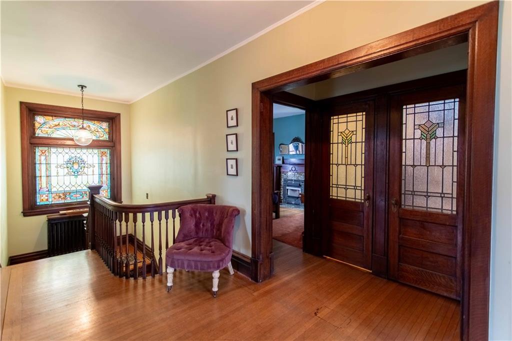 5901 Hampton Street Pittsburgh, PA 15206 - Photo 34 of 42 a view of a bedroom with furniture and windows