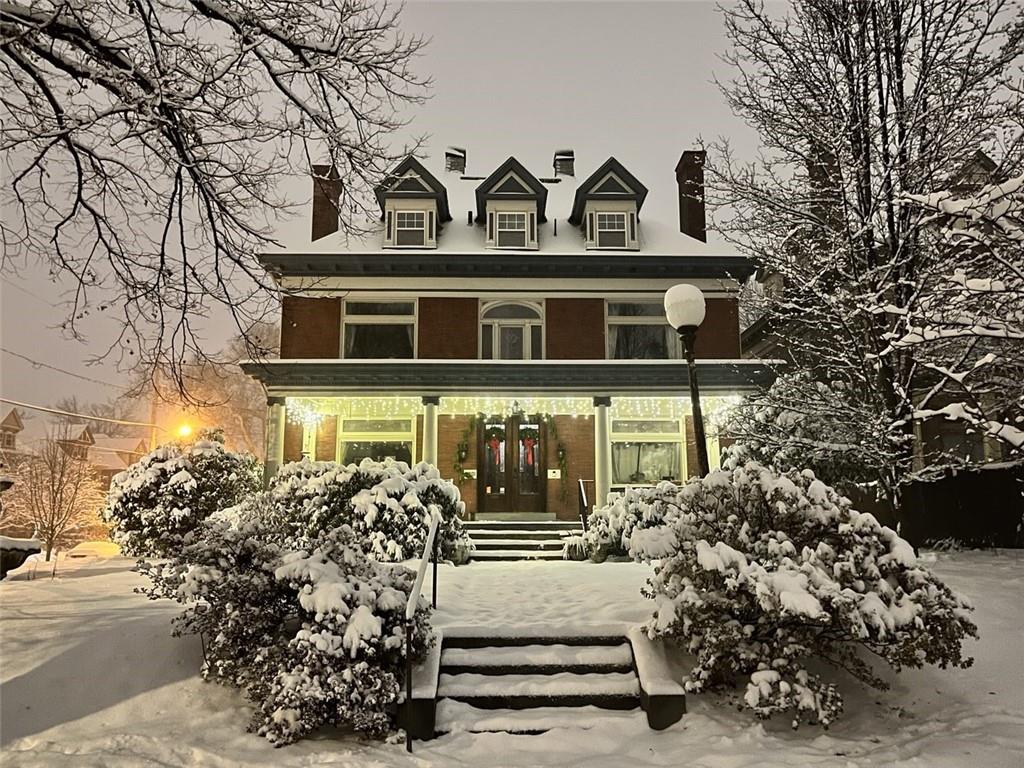 5901 Hampton Street Pittsburgh, PA 15206 - Photo 42 of 42 front view of a house with a small yard
