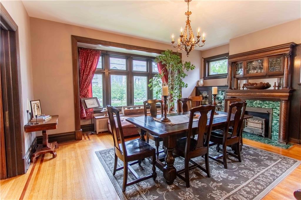 5901 Hampton Street Pittsburgh, PA 15206 - Photo 7 of 42 a view of a dining room with furniture window and wooden floor